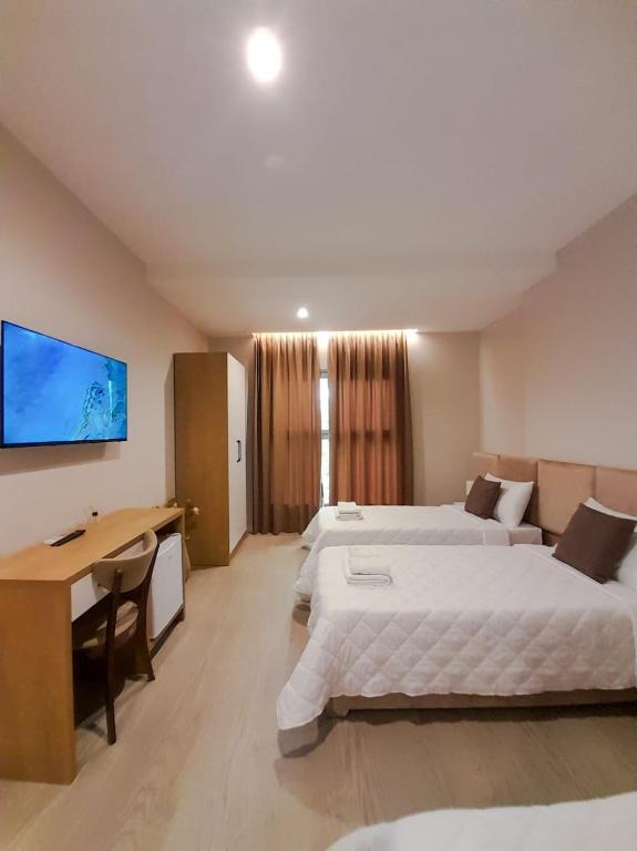 Postel nebo postele na pokoji v ubytování Solea Hotel