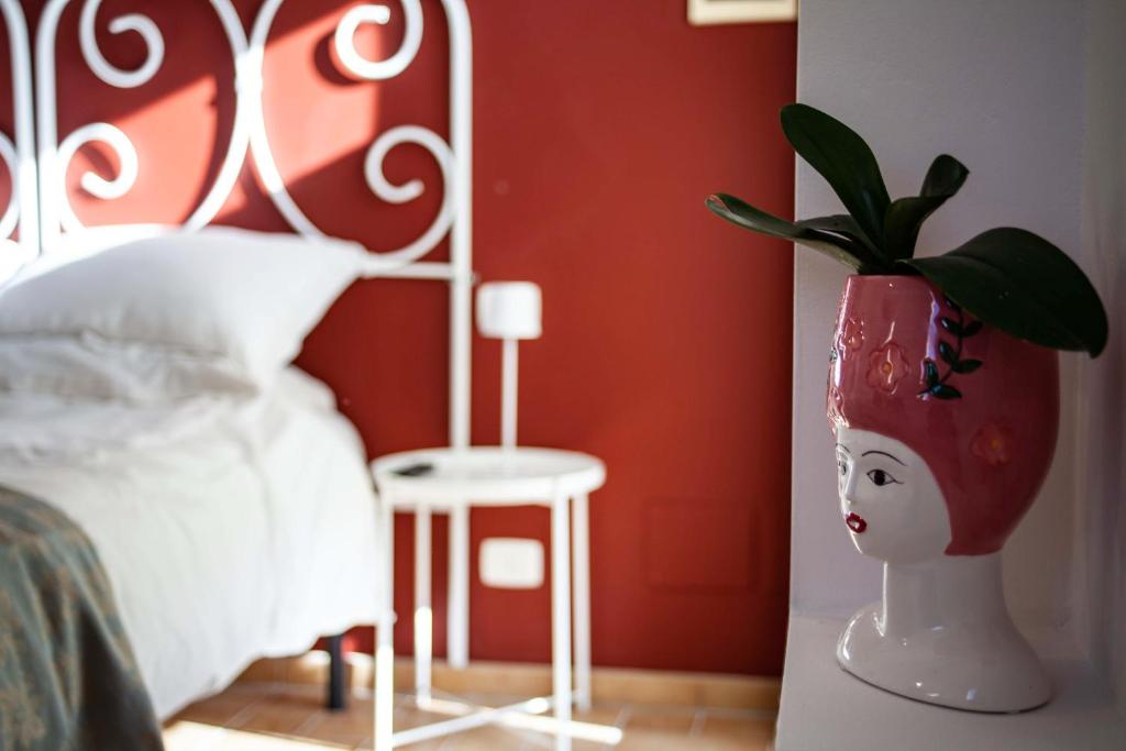 A bed or beds in a room at Audaces Resort