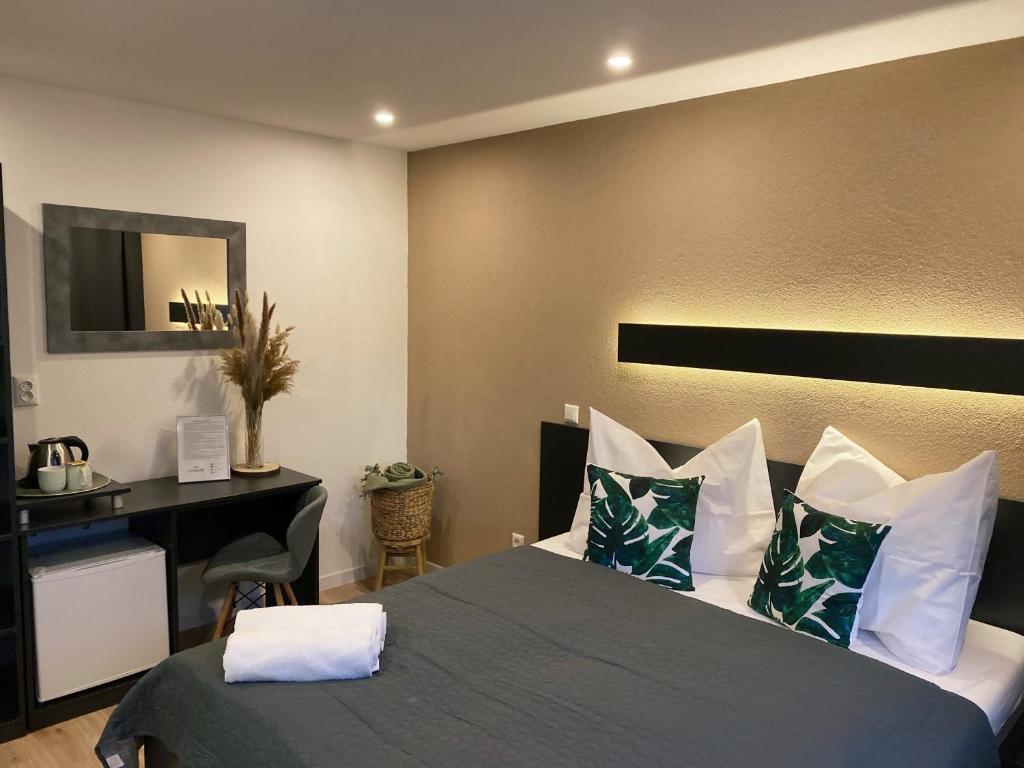 Posteľ alebo postele v izbe v ubytovaní Vila LEMAR wellness & spa