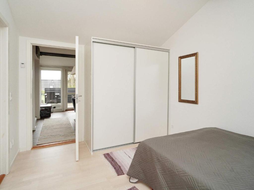 Postel nebo postele na pokoji v ubytování Holiday home Slagelse XIX