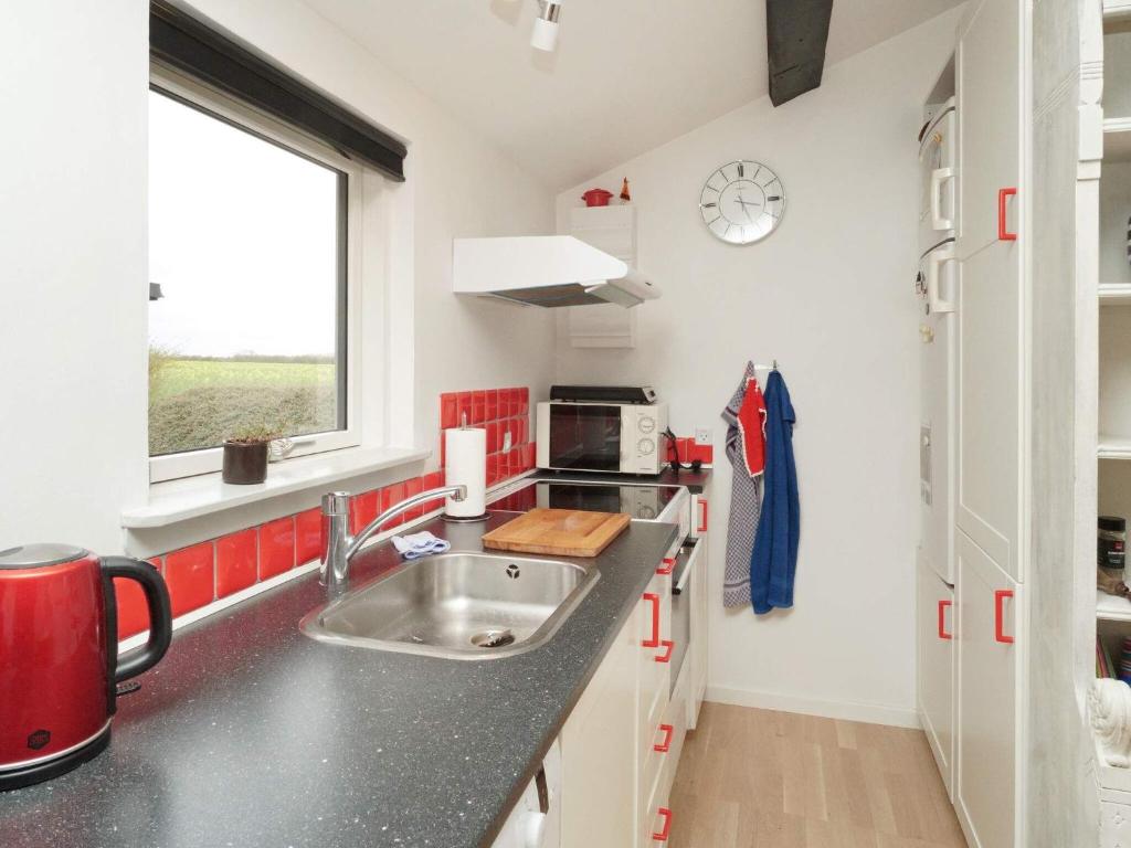 Kuchyň nebo kuchyňský kout v ubytování Holiday home Slagelse XIX