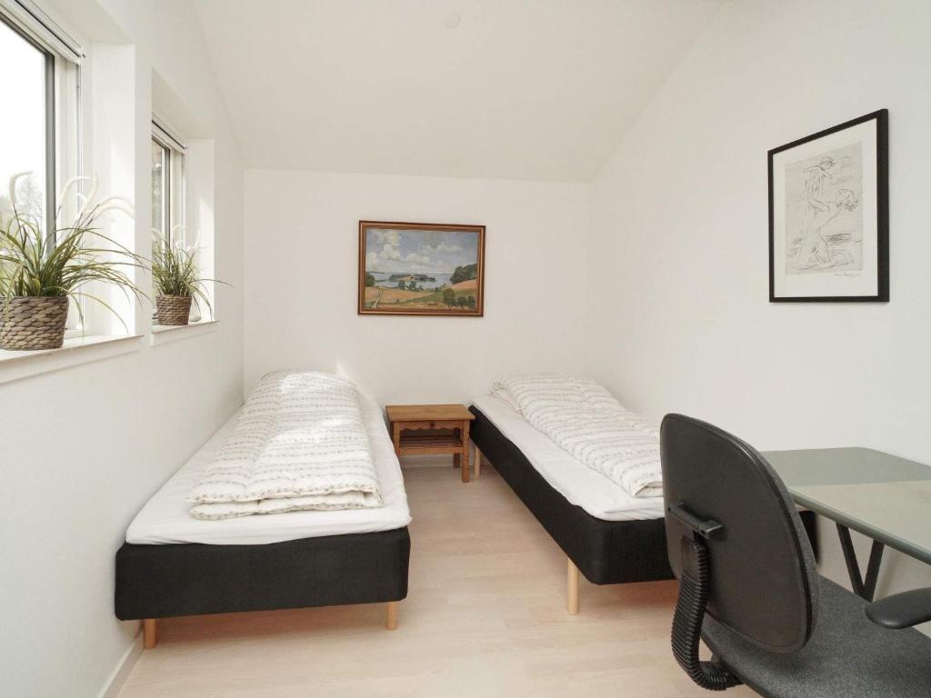 Postel nebo postele na pokoji v ubytování Holiday home Slagelse XIX