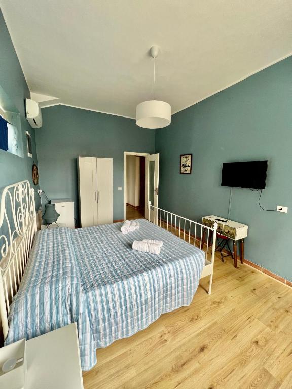 Postel nebo postele na pokoji v ubytování B&B Villa Dunardi