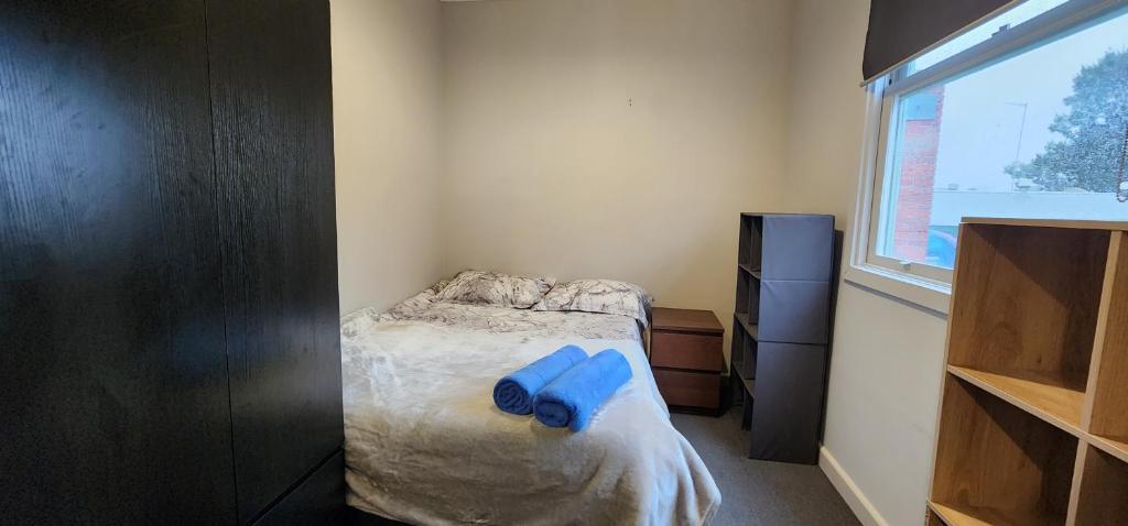 Postel nebo postele na pokoji v ubytování 50 Green St Windsor