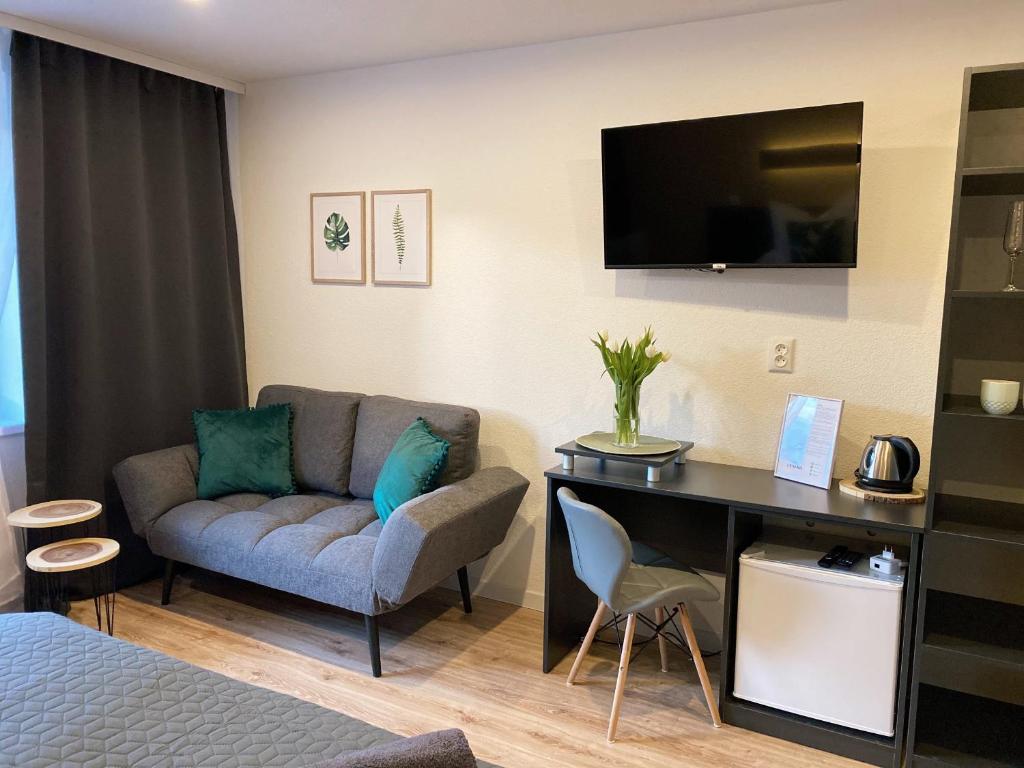 TV a/nebo společenská místnost v ubytování Vila LEMAR wellness & spa