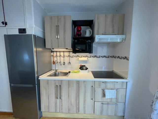 Kuchyňa alebo kuchynka v ubytovaní APARTAMENTO VACACIONAL