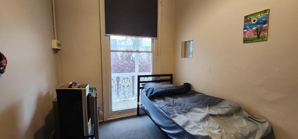 Postel nebo postele na pokoji v ubytování 50 Green St Windsor