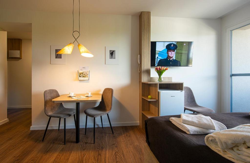 TV a/nebo společenská místnost v ubytování Residence Šírava ***