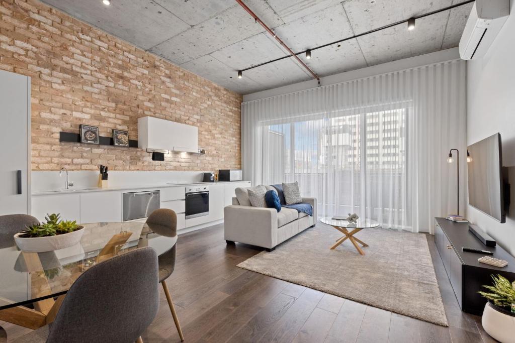 a living room with a couch and a table at Phenomenal Stay In Phillip in Phillip
