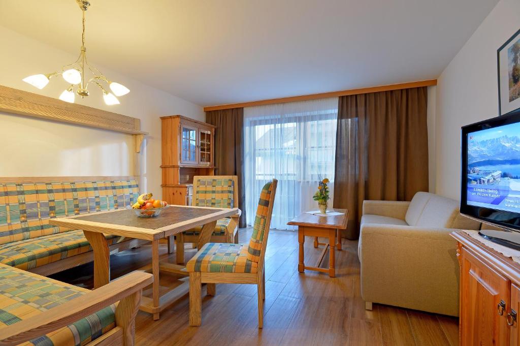 TV a/nebo společenská místnost v ubytování Appartement Fuchs Ferdinand
