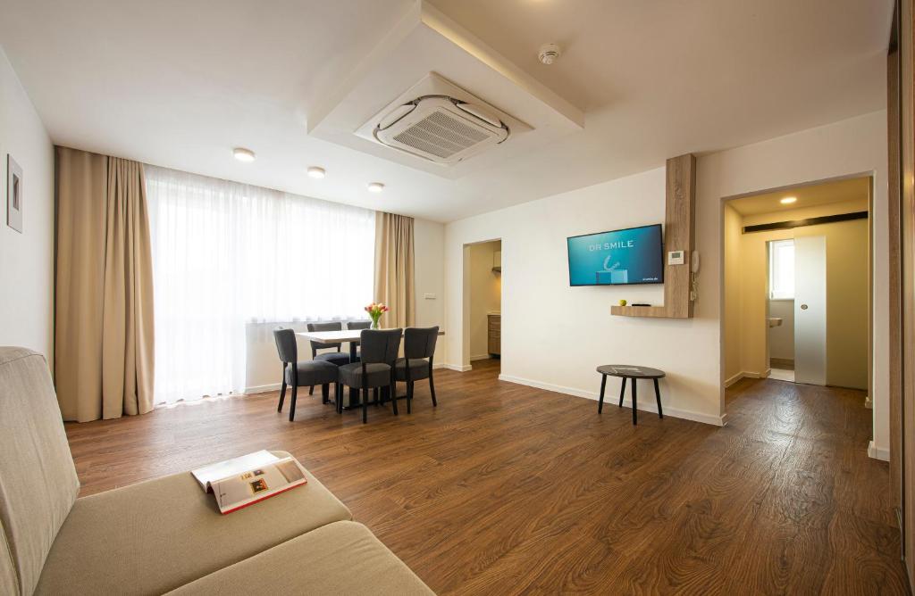 TV a/nebo společenská místnost v ubytování Residence Šírava ***
