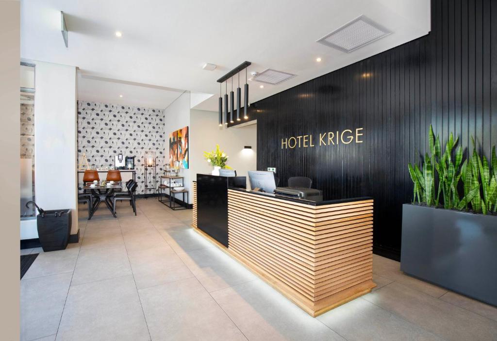 Een restaurant of ander eetgelegenheid bij Hotel Krige