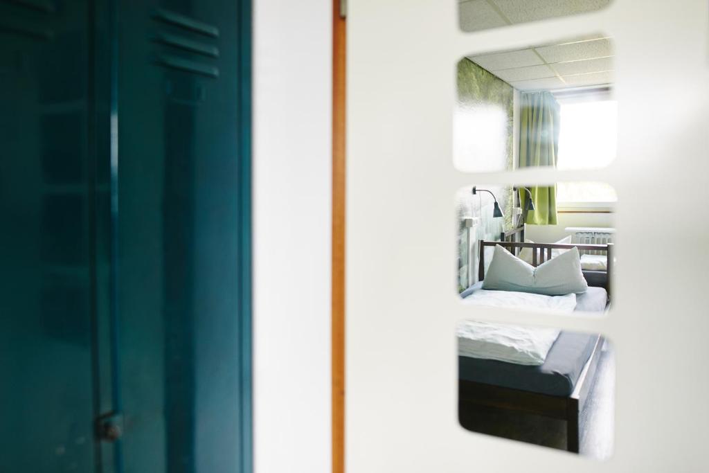 Postel nebo postele na pokoji v ubytování Sleep Station Hostel