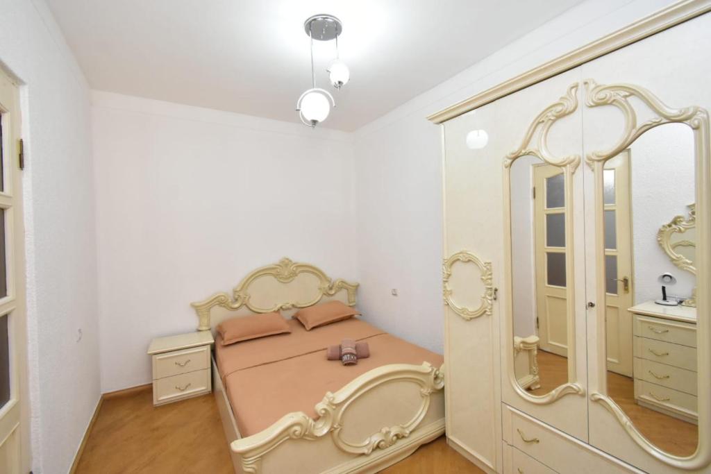 Postel nebo postele na pokoji v ubytování Guesthouses Opera