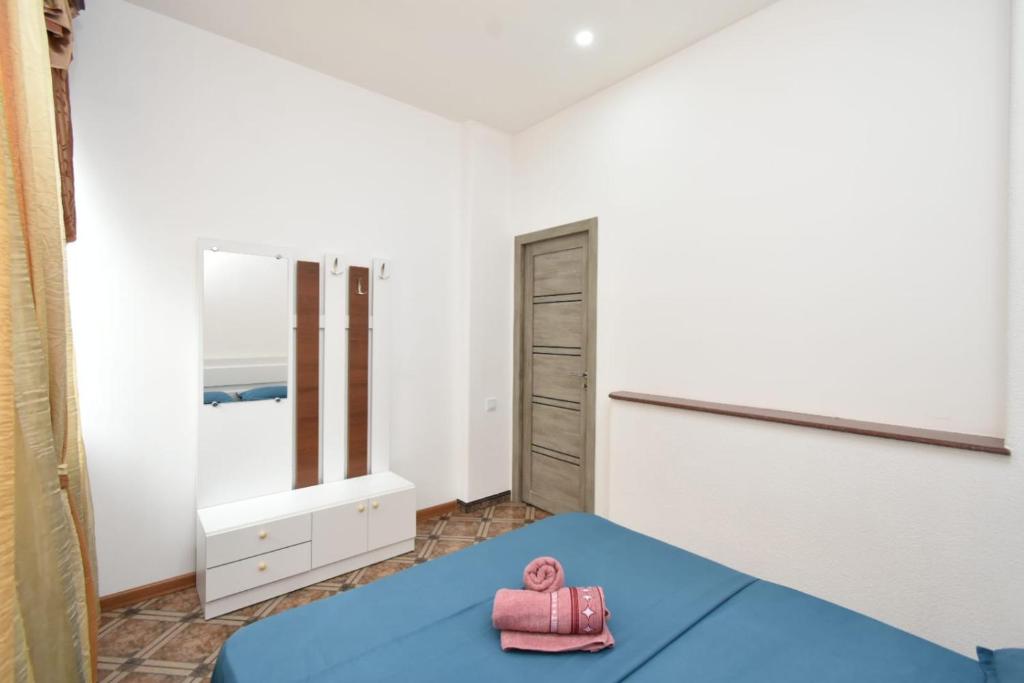 Postel nebo postele na pokoji v ubytování Guesthouses Opera