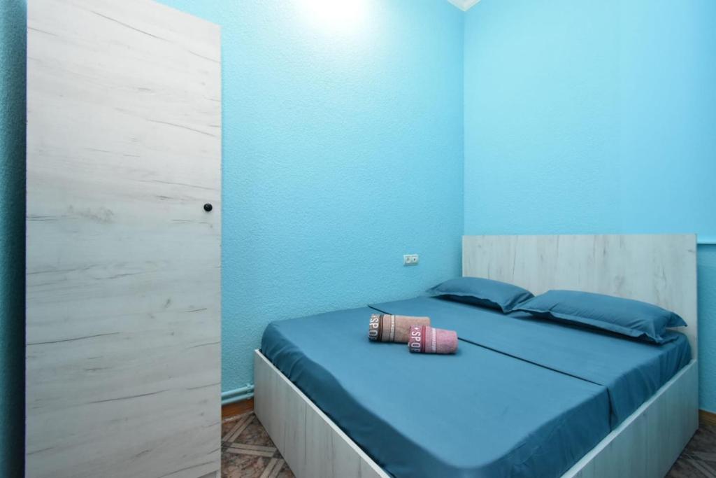 Postel nebo postele na pokoji v ubytování Guesthouses Opera