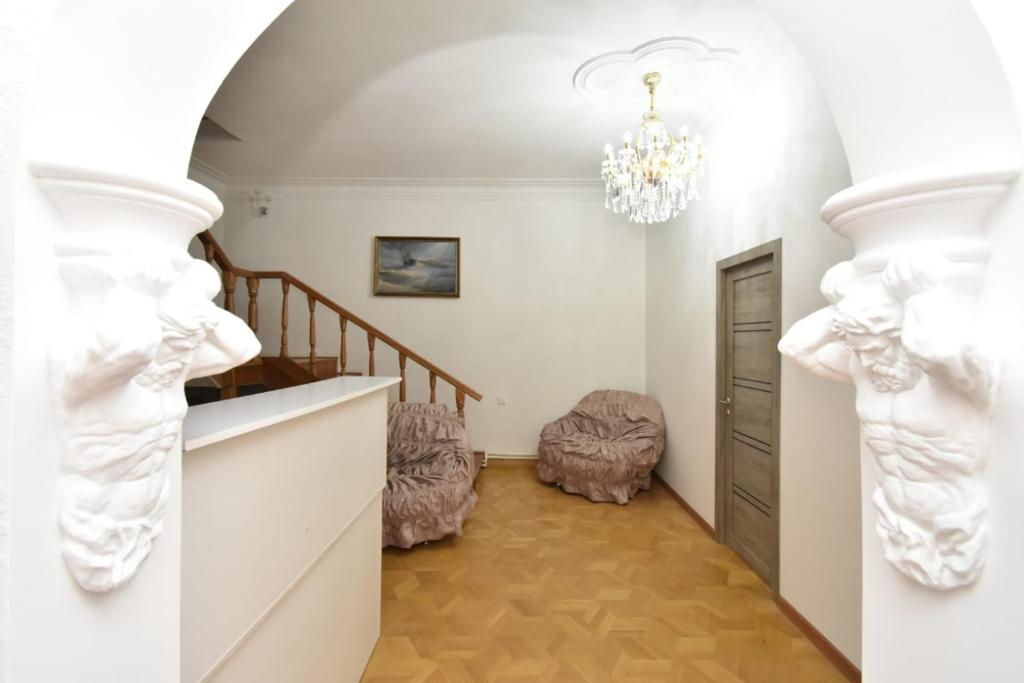 Postel nebo postele na pokoji v ubytování Guesthouses Opera