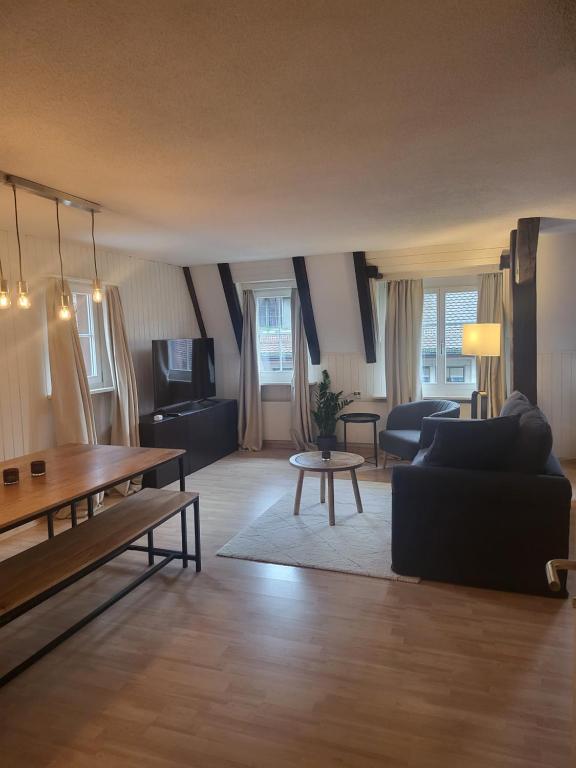 Posezení v ubytování Stylish Apartment in the Heart of Zug by Airhome