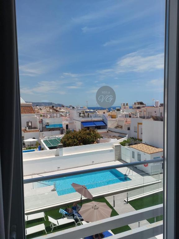 Bazén v ubytování Nerja VG Hostal Boutique nebo v jeho okolí