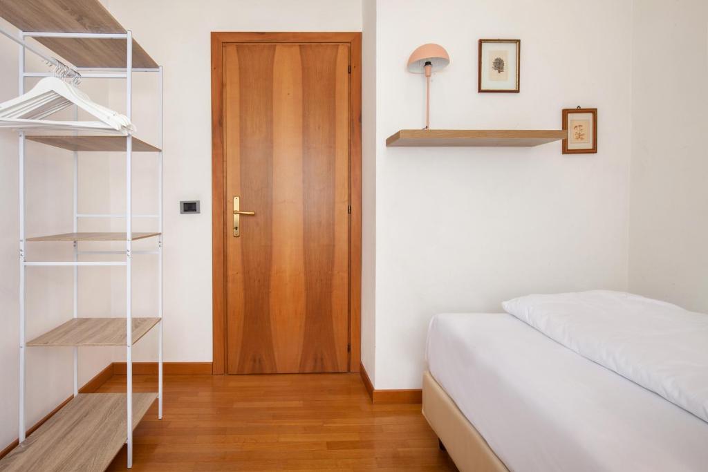 Łóżko lub łóżka w pokoju w obiekcie Casa Beatrice