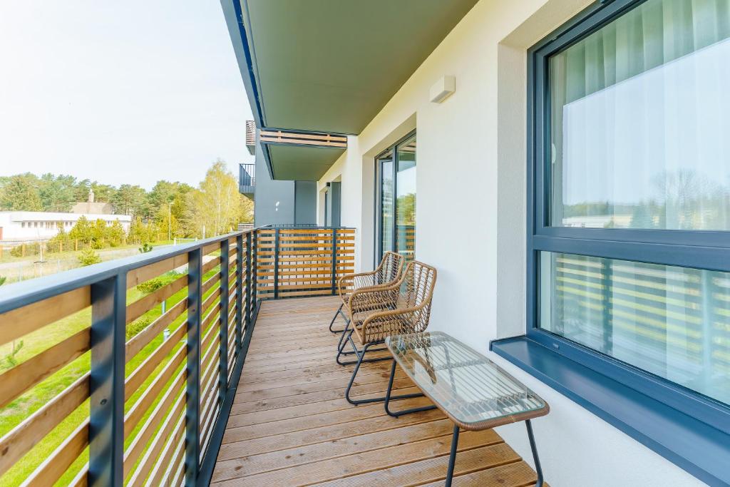 Balkón alebo terasa v ubytovaní Apartament DUNE SurfingBird Dźwirzyno