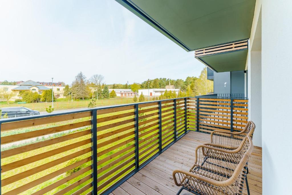 Balkón alebo terasa v ubytovaní Apartament DUNE SurfingBird Dźwirzyno