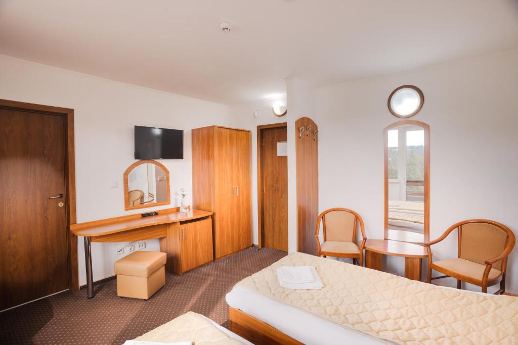 Postel nebo postele na pokoji v ubytování Hotel Bianca