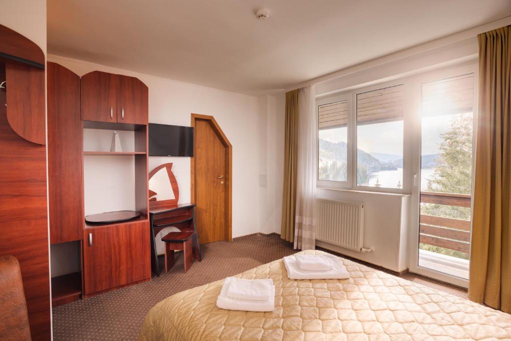 Postel nebo postele na pokoji v ubytování Hotel Bianca