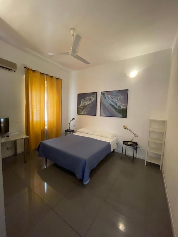 Łóżko lub łóżka w pokoju w obiekcie Milano Canal Apartments