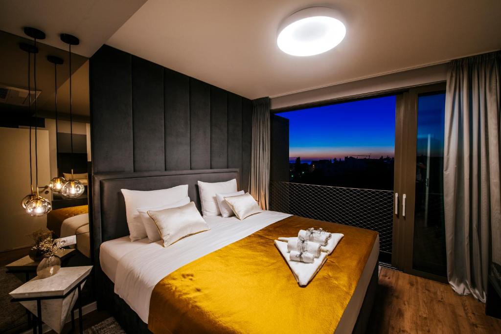 Postel nebo postele na pokoji v ubytování Dedaj Resort - Villa Auri
