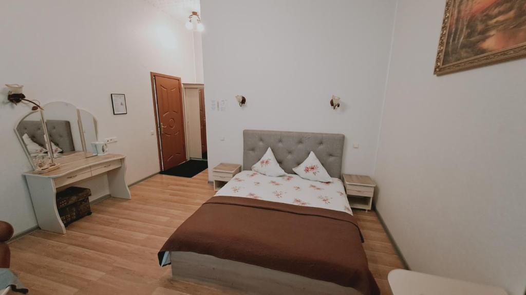Postel nebo postele na pokoji v ubytování Saules rati