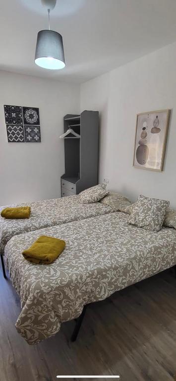 Postel nebo postele na pokoji v ubytování 3Centro Malaga especial grupos Parking gratis