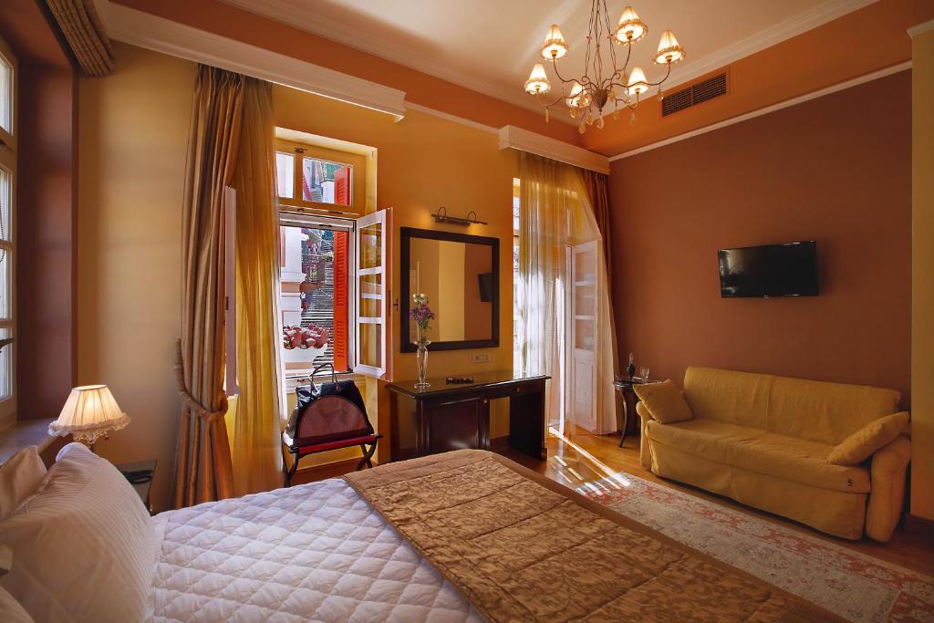 Posteľ alebo postele v izbe v ubytovaní Aetoma Hotel