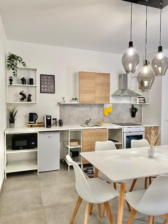 Kuchyň nebo kuchyňský kout v ubytování Cava Home - Castelli Apartments