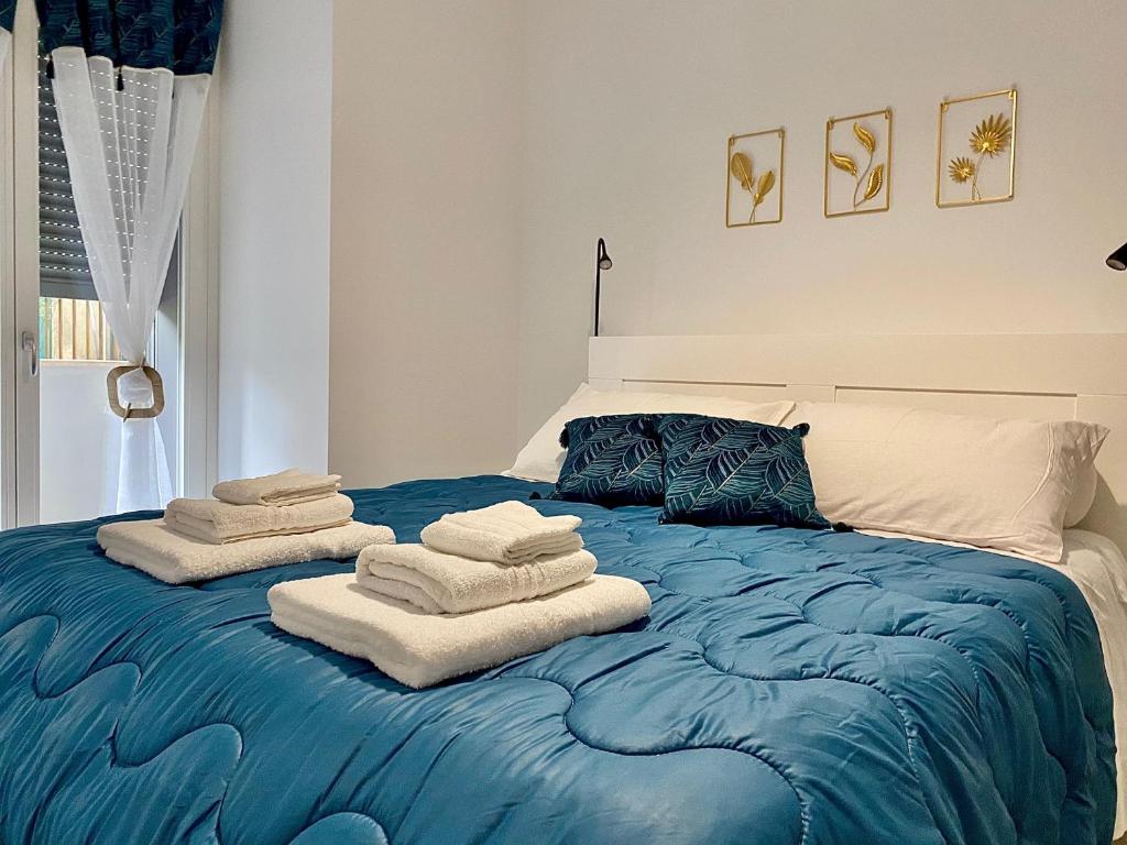 Postel nebo postele na pokoji v ubytování Cava Home - Castelli Apartments