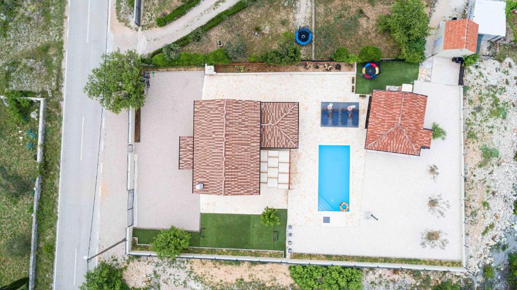 an overhead view of a house with a roof at Villa Lucia in Skradin