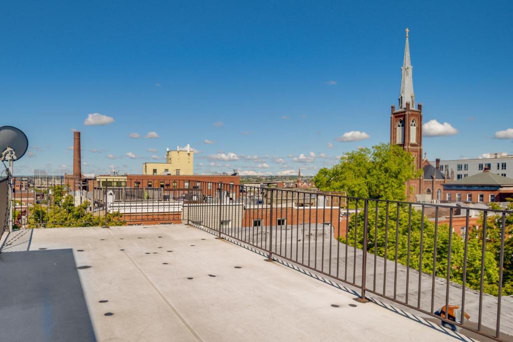 a view of a city from the roof of a building at Quaint Baltimore Townhouse about 1 Mi to Inner Harbor! in Baltimore