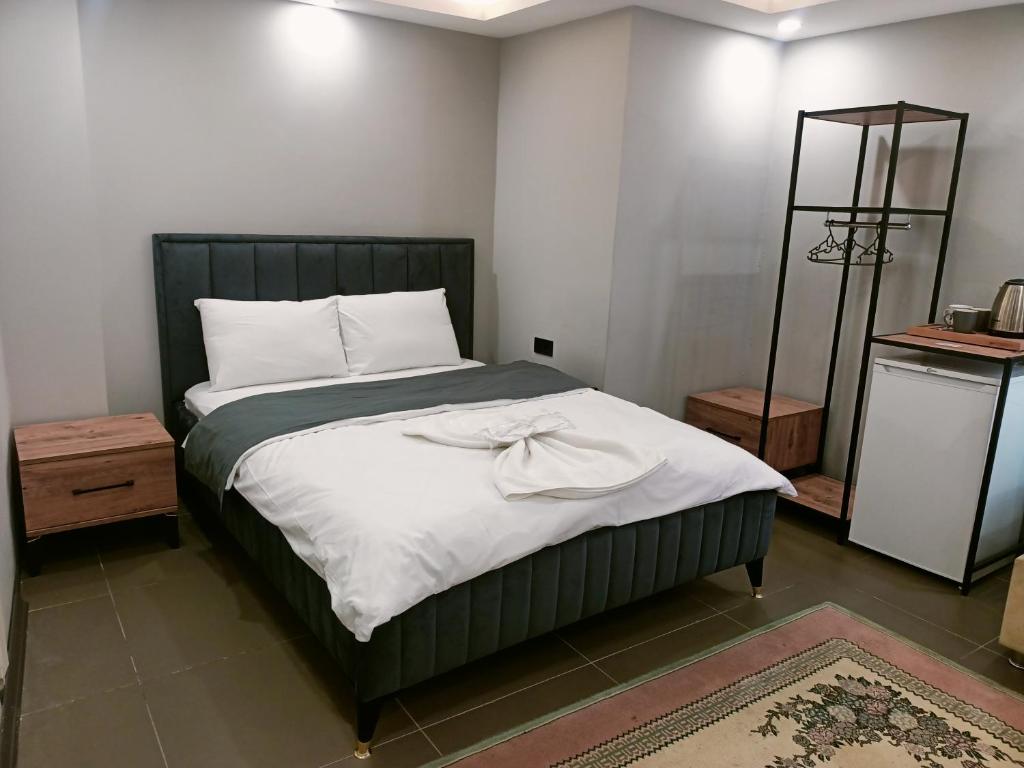 Tempat tidur dalam kamar di Torch Suit