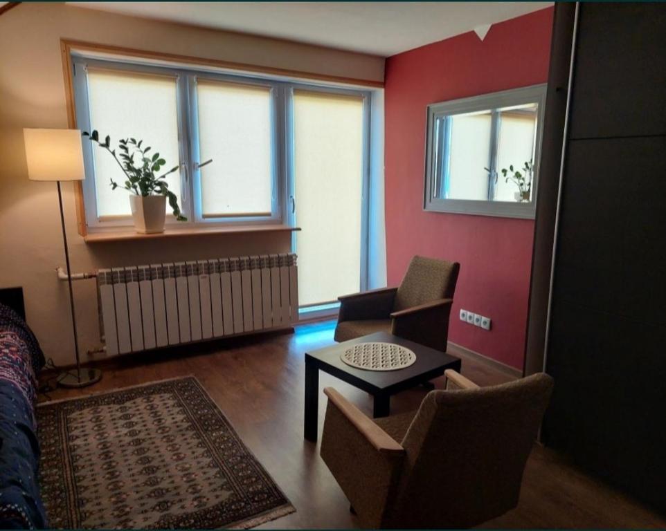 Χώρος καθιστικού στο Pokoje u Ali