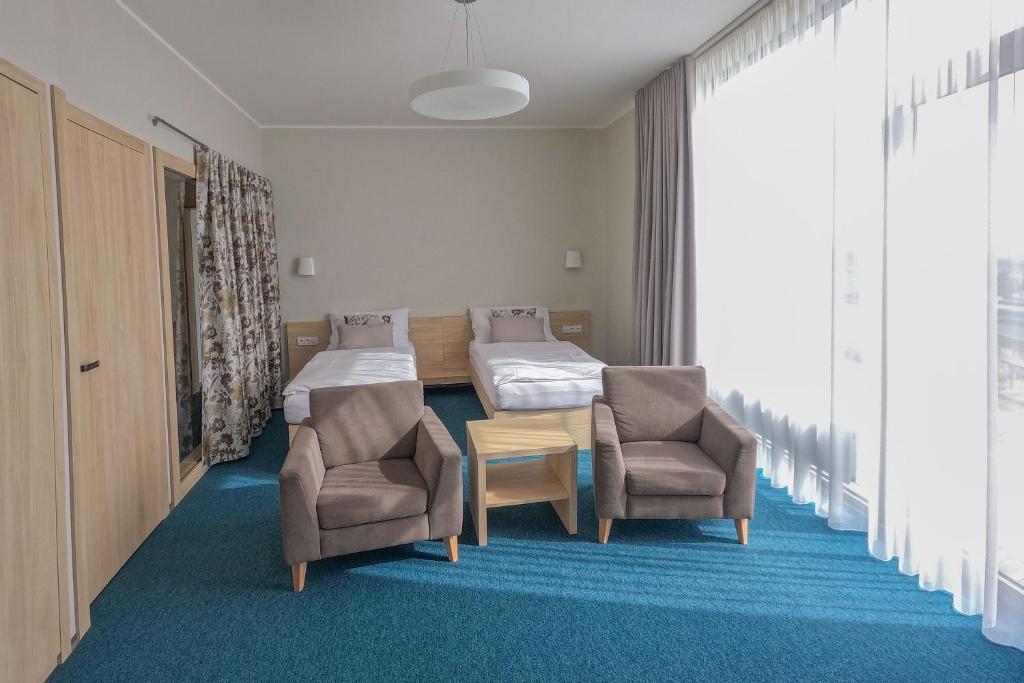Posezení v ubytování Hotel Vinice Hnanice