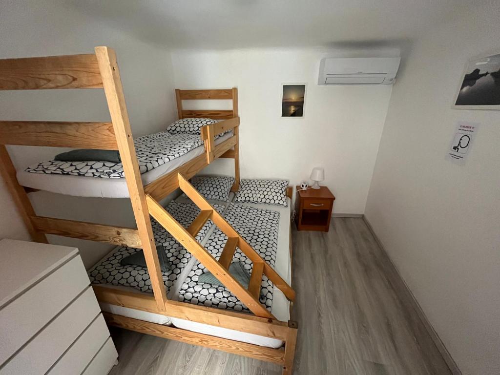 Postel nebo postele na pokoji v ubytování Hostel Piran