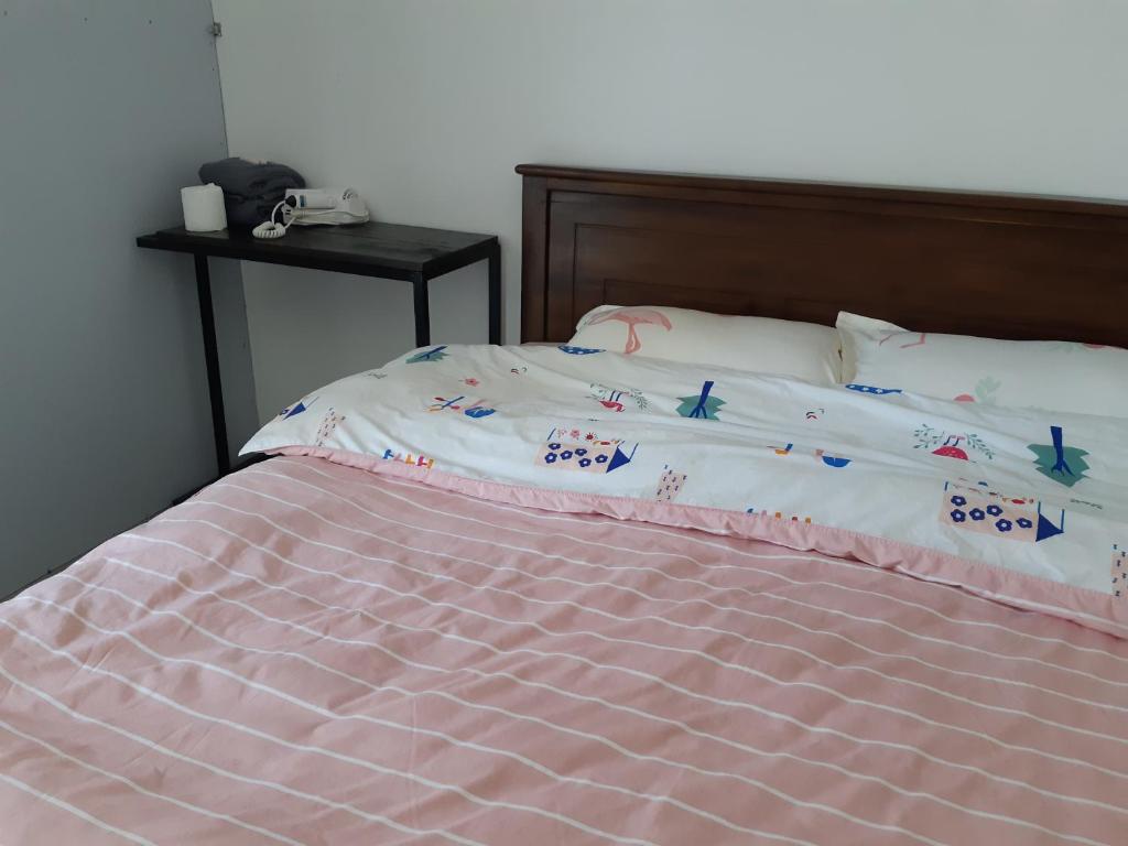 Postel nebo postele na pokoji v ubytování Siril Guesthouse Hostel