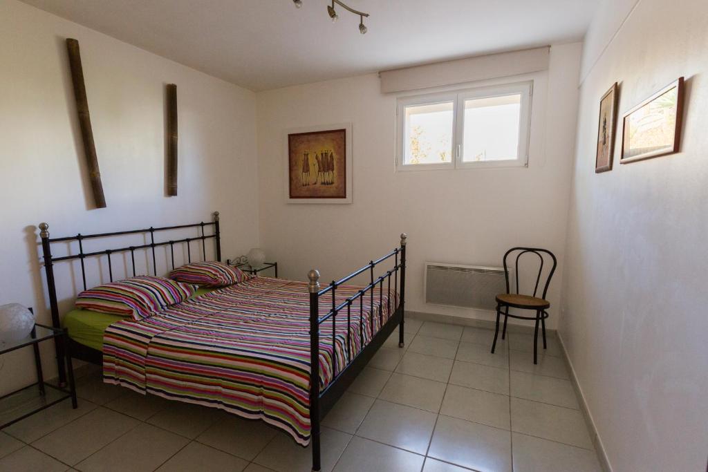 Postel nebo postele na pokoji v ubytování Mer et calme