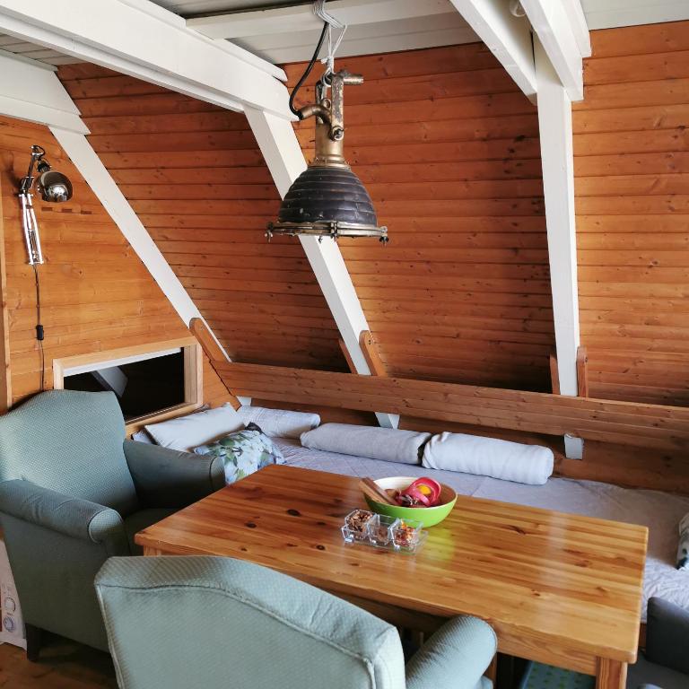 Posedenie v ubytovaní Pfahlbau Sunset II Toplage inklusive Elektroboot