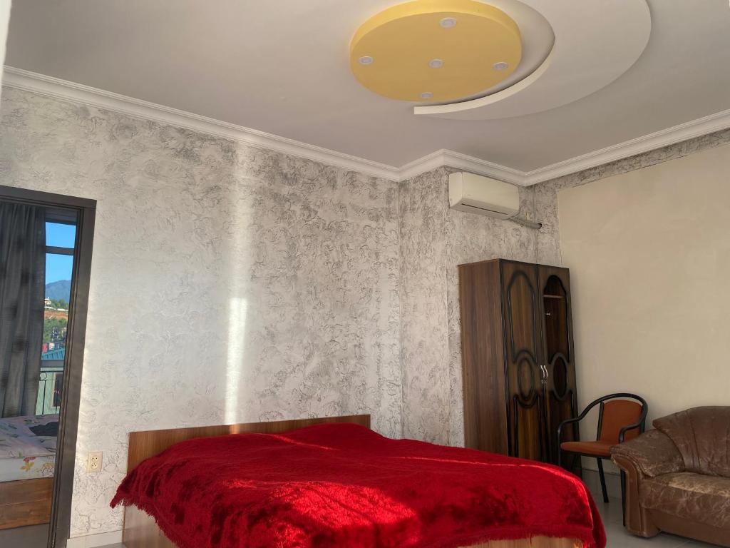 Postel nebo postele na pokoji v ubytování Merab House