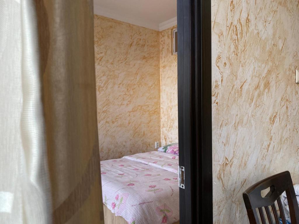 Postel nebo postele na pokoji v ubytování Merab House