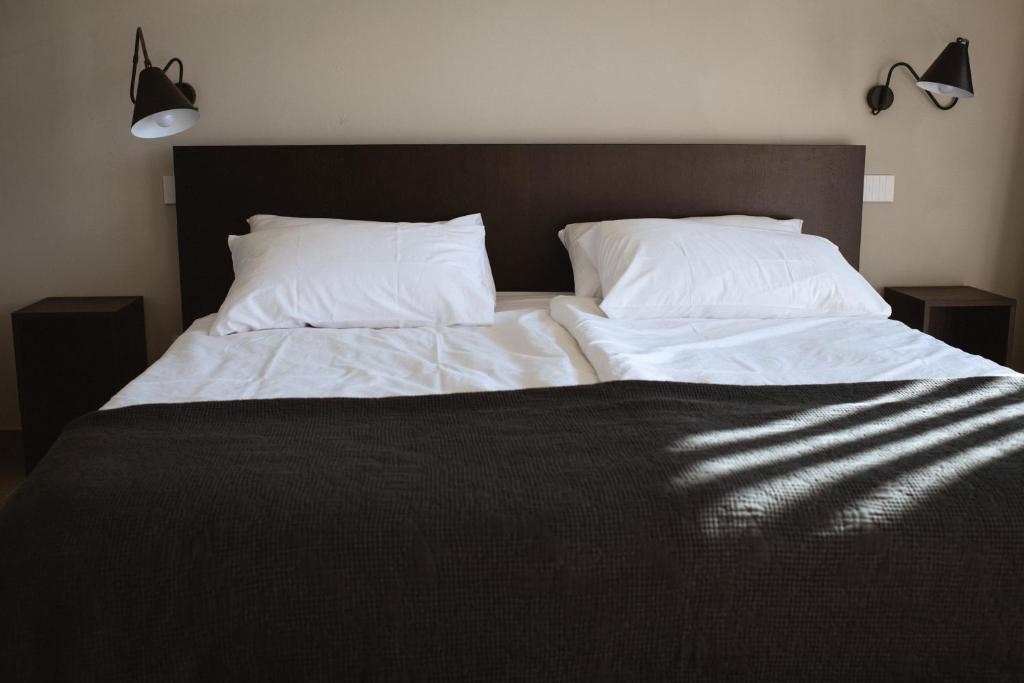 Postel nebo postele na pokoji v ubytování Residenza Cavaion