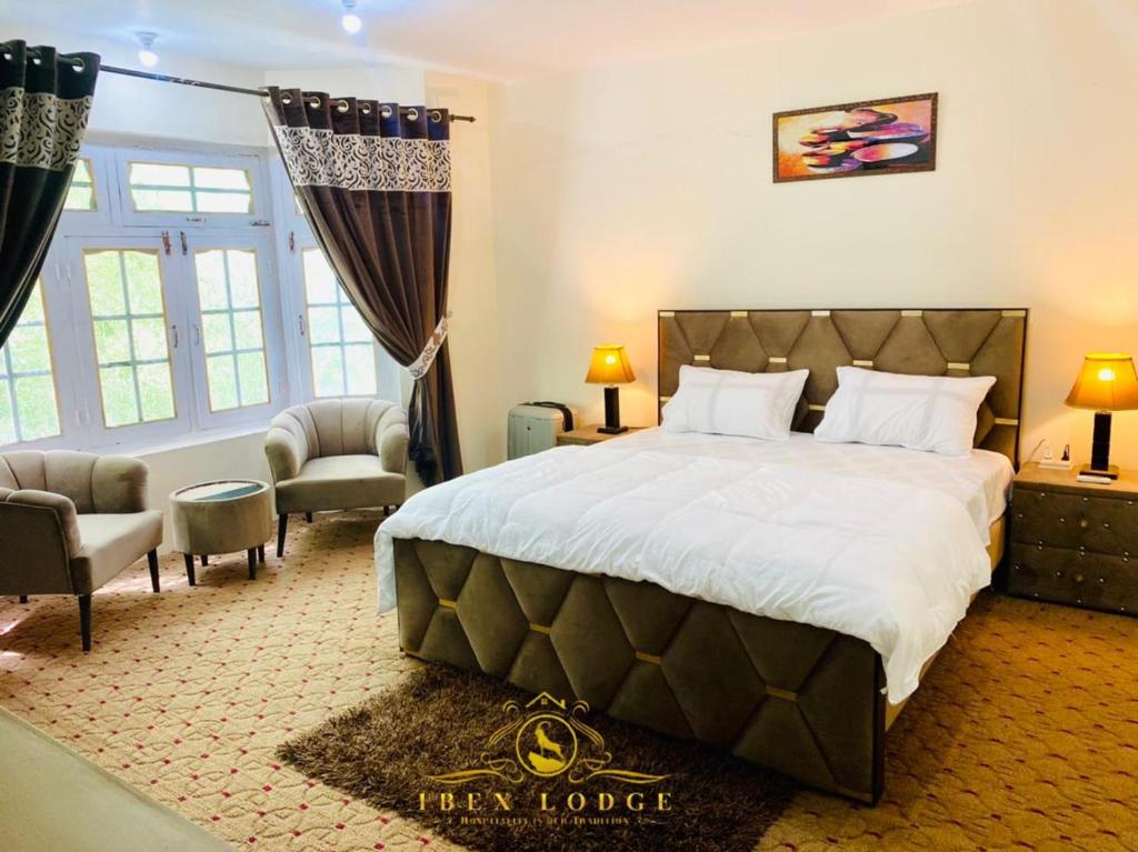 Postel nebo postele na pokoji v ubytování Ibex lodge Skardu