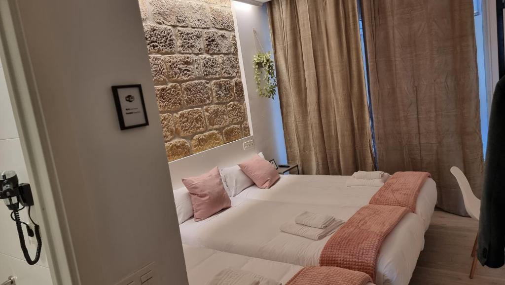 Postel nebo postele na pokoji v ubytování Hotel Norte