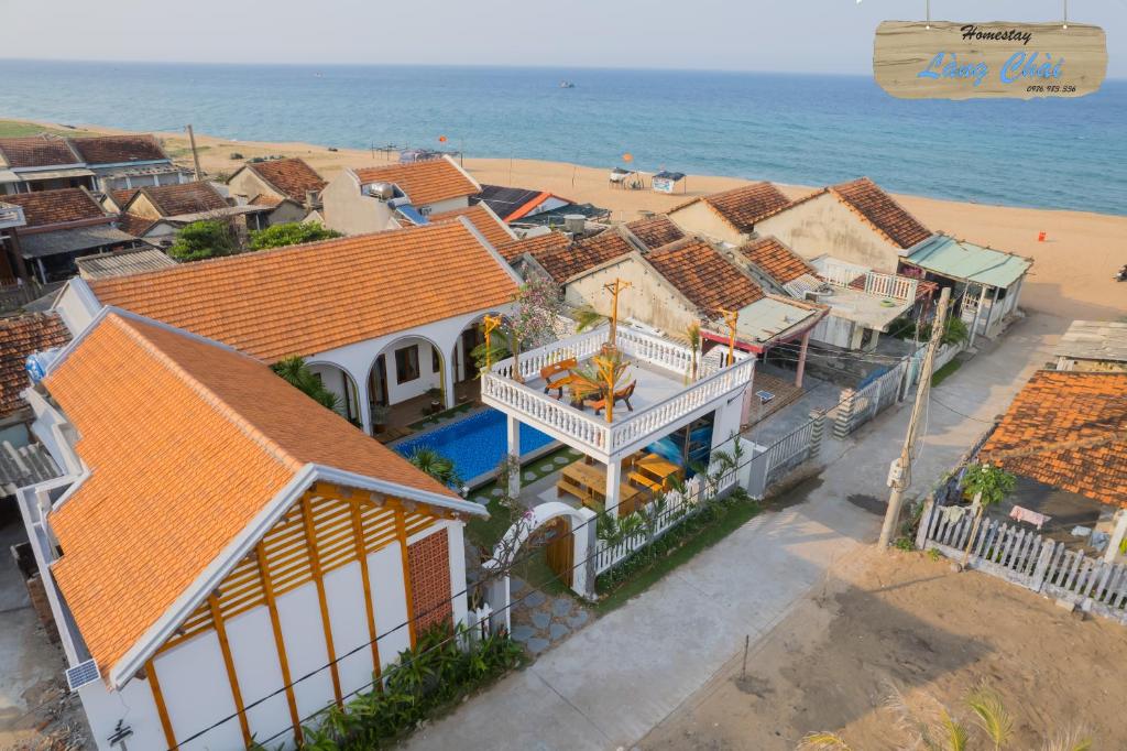 an aerial view of a house on the beach at Làng Chài Homestay Phú Yên in Phu Yen